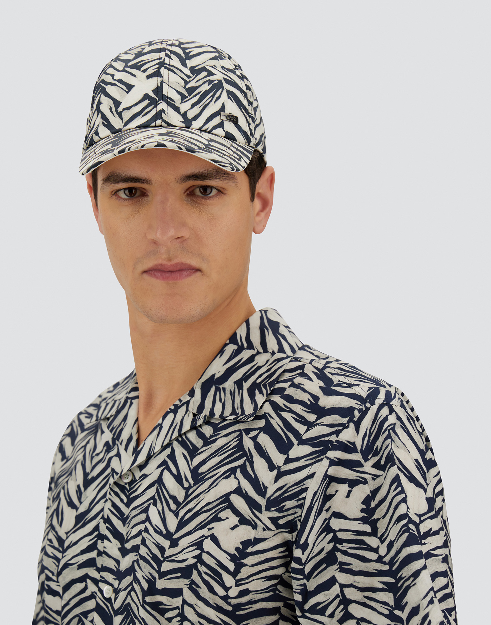 Herno Resort Baseball Cap In Nylon Seasonal Print And Travel Nylon Ponente In Black